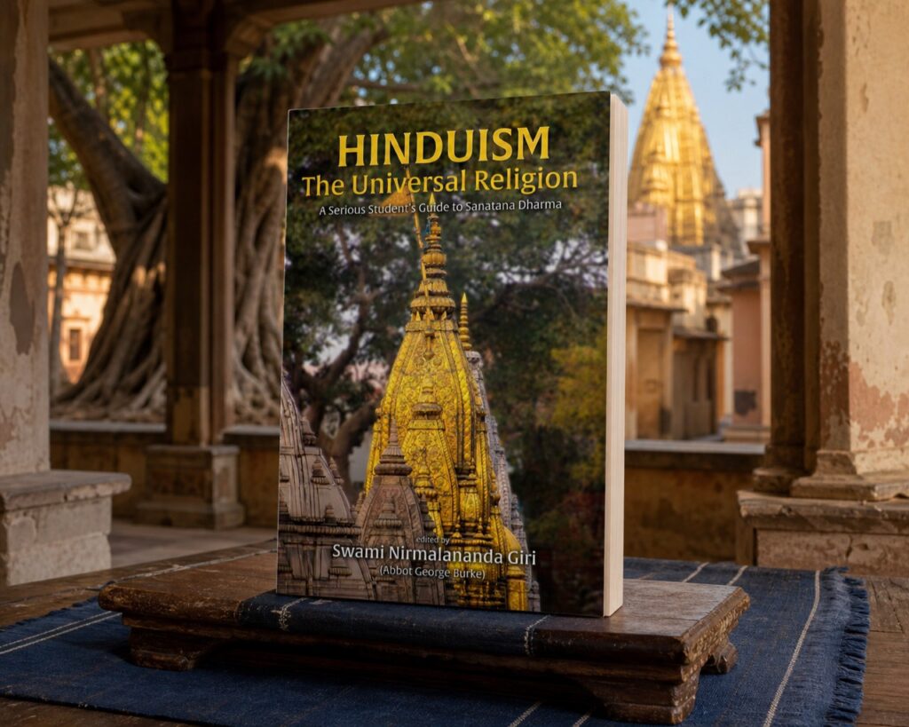 Hinduism: The Universal Religion paperback in a Varanasi temple setting