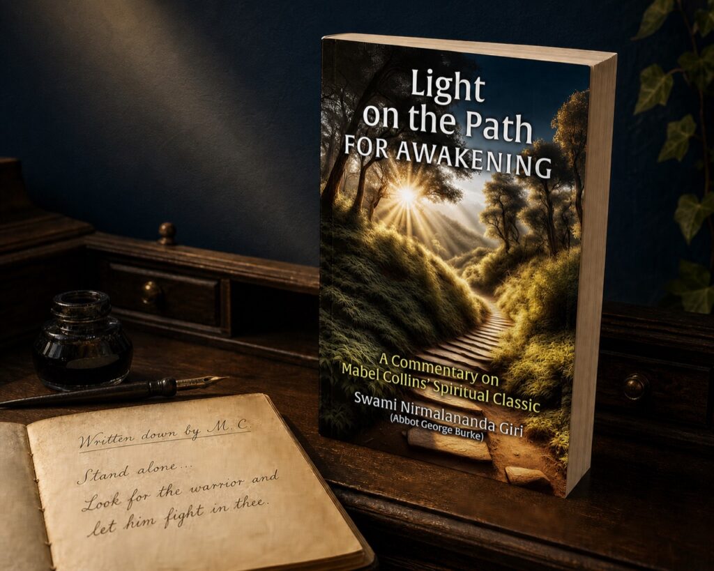 Light on the Path for Awakening paperback beside a handwritten manuscript, ink bottle, and pen