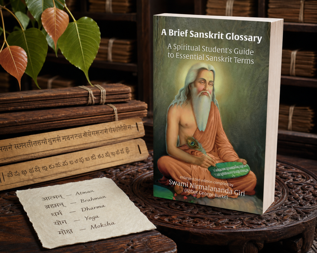A Brief Sanskrit Glossary paperback displayed with palm-leaf manuscripts and a Sanskrit vocabulary sheet